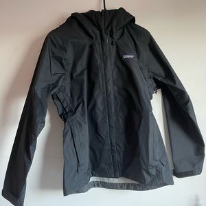 Black Patagonia rain jacket. Lightweight with a hood. Women’s size small